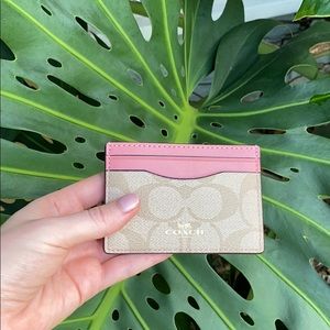 Blush pink Coach card holder
